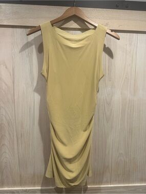 Norma Kamali. Sleeveless Pickleball Mini Dress
